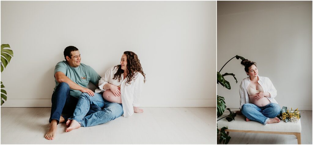 maternity photos of expectant mom wearing open white shirt and jeans bearing her pregnant belly in white studio.